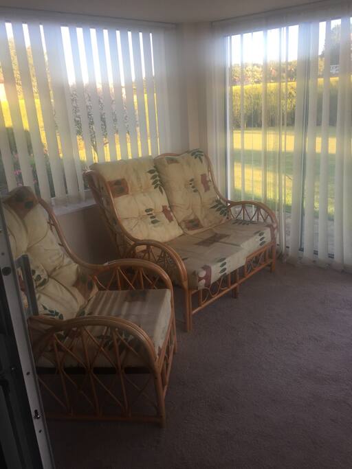 South-facing sun lounge, perfect for relaxing in.