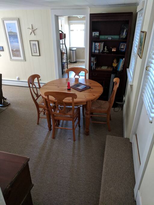 dining table; view into kitchen