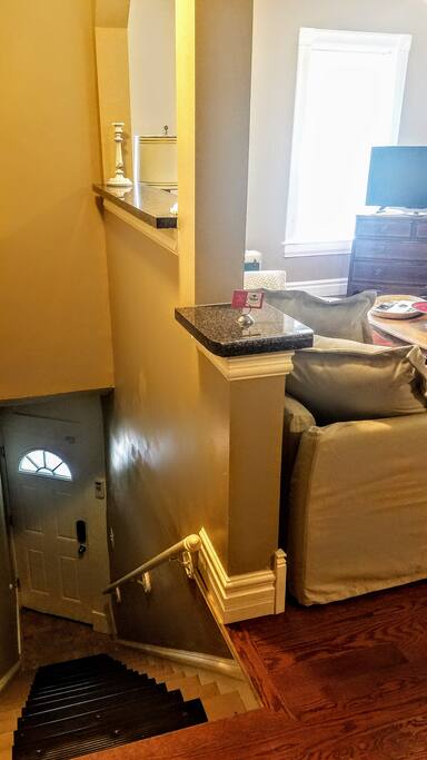 Stairs lead up to second floor
