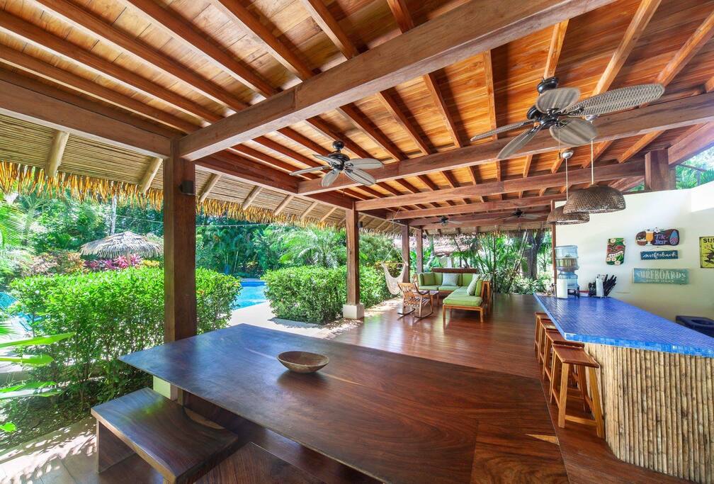 Interior of the rancho, with dining, living room, kitchen, bathroom and shower