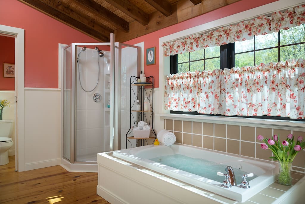 En suite bath with Jacuzzi tub and separate shower