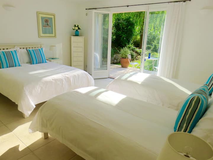 Bedroom 5 Family Room with its own large en-suite bathroom with a bath and shower.
