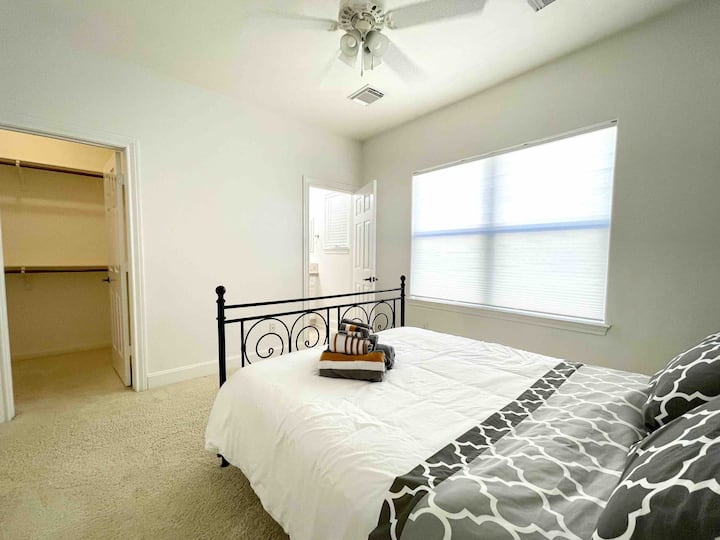Bright and cozy 3rd floor bedroom with walk-in closet and bathroom. 