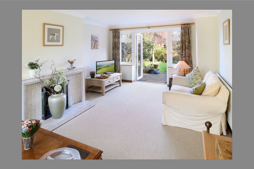 Looking from the light airy lounge to the walled garden.