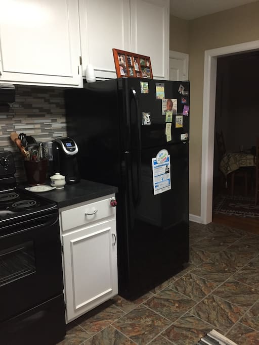 The kitchen features modern appliances that guests may use.