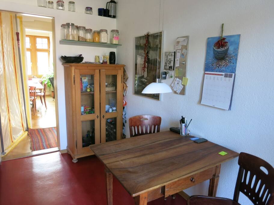 Kitchen, rear view with living room across the hallway