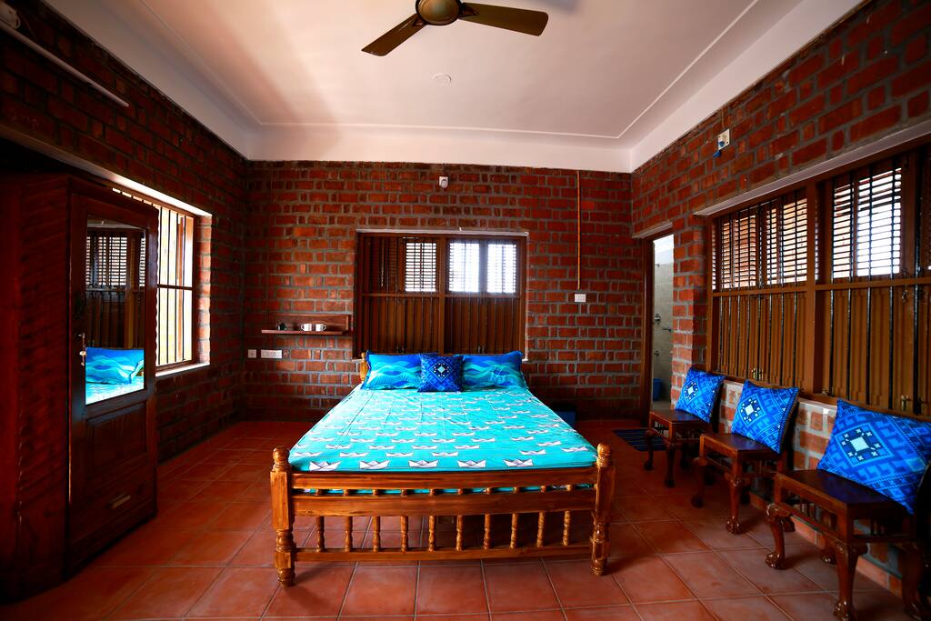 The Copacabana Room - named after the famous beach from Rio, this room is themed in vibrant blue hues. This suite double bedroom is spacious, airy, has an attached bath, and a private balcony that overlooks the beach and sea. The room has TV, wardrobe and kettle.