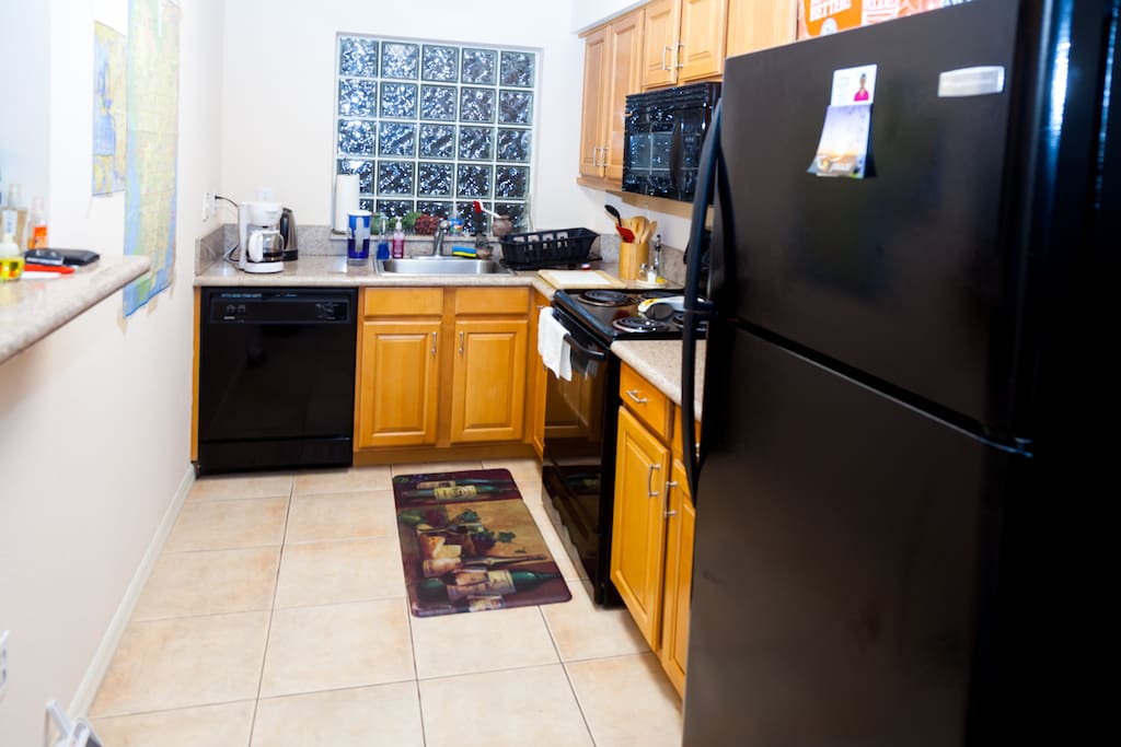 Fully equipped kitchen with plenty pantry spaces.