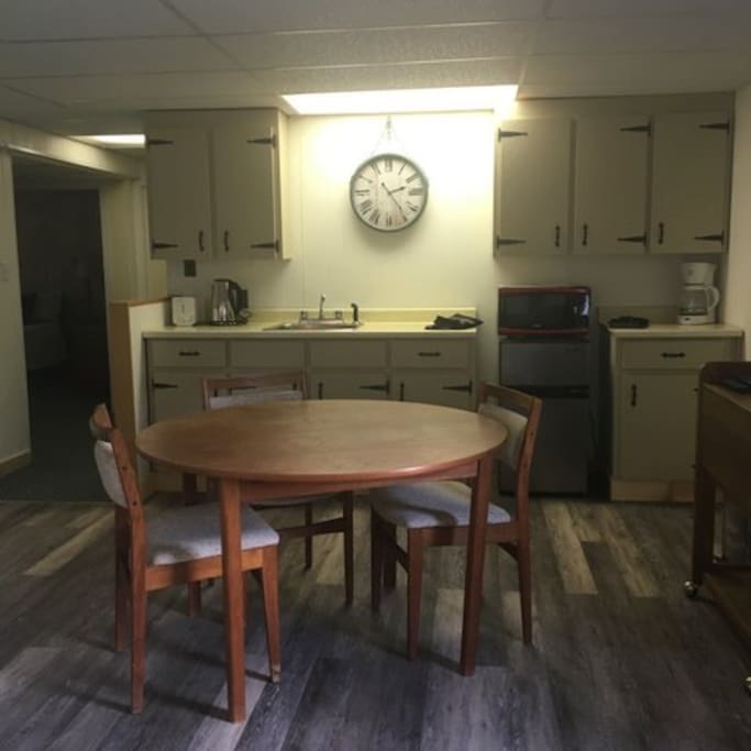 This clean, spacious kitchen comes fully equipped with cutlery, dishes, coffee and more.