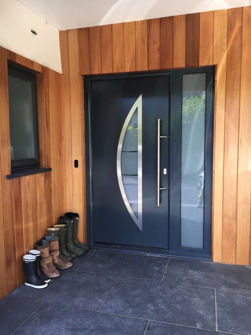Our front door, dry area for wellies!