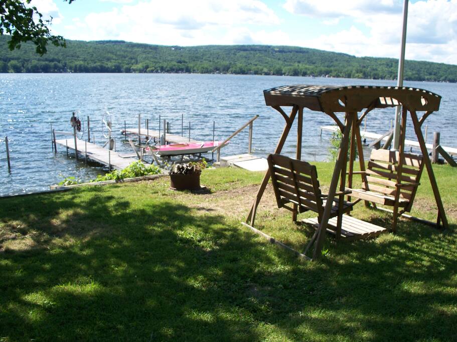 lakefront with dock, hoist and swing
