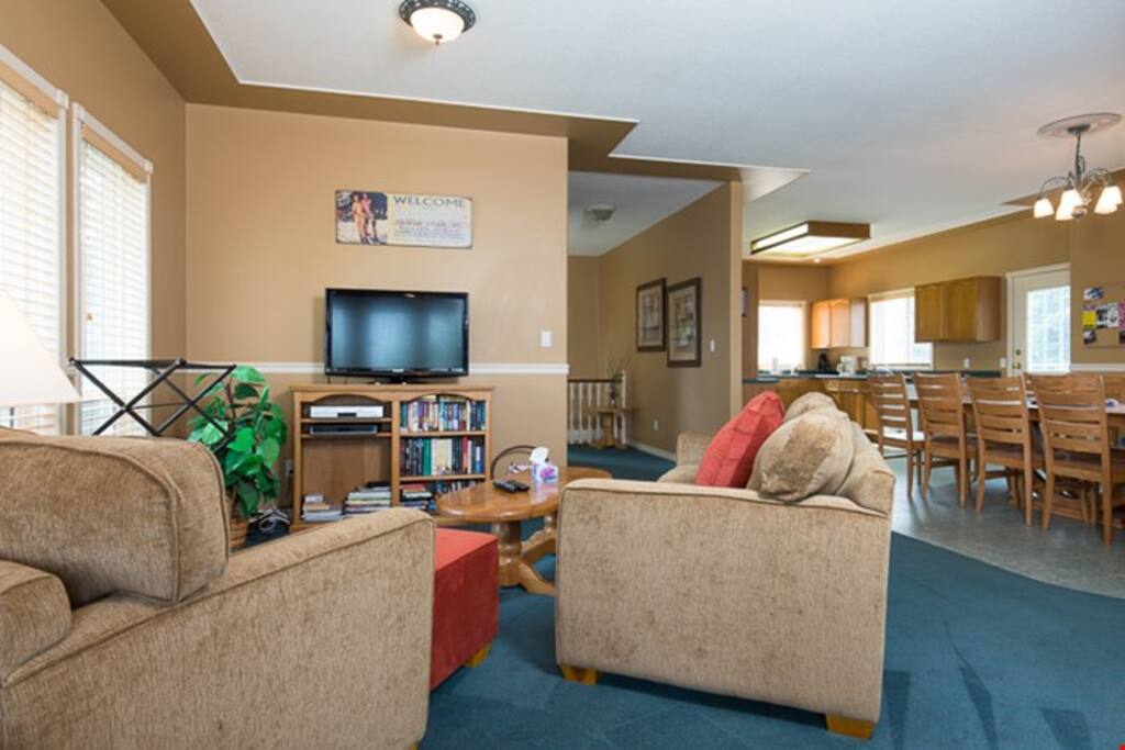 The open-concept living room is spacious and bright.