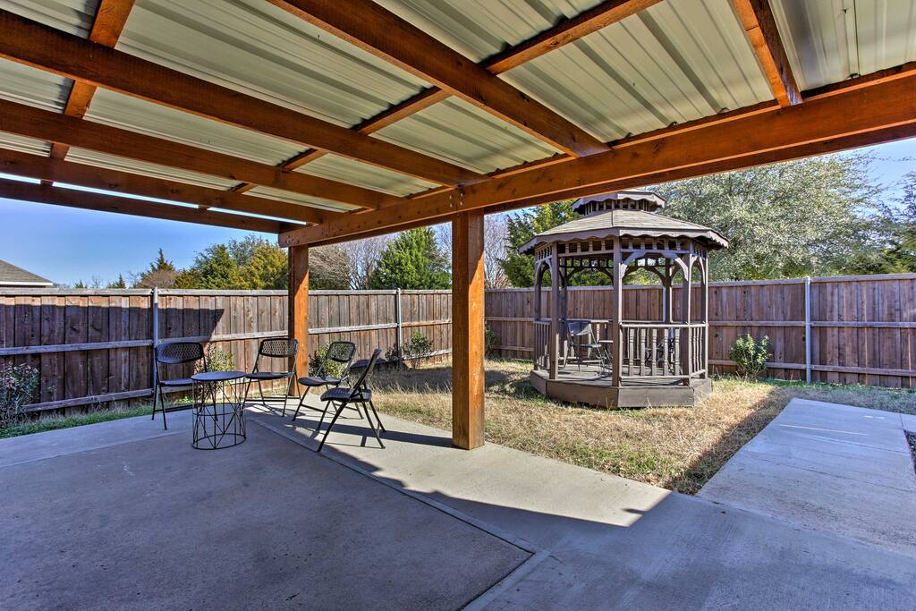 Relax with your loved ones on the covered patio.