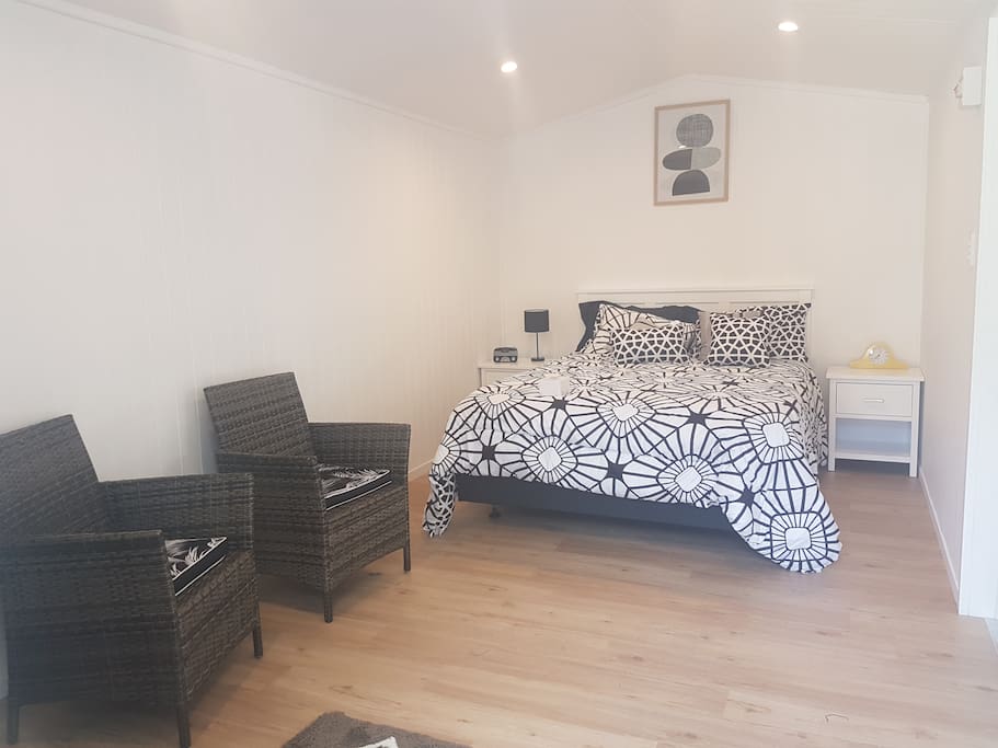 Queen bed with clean bedding changes every 2nd day