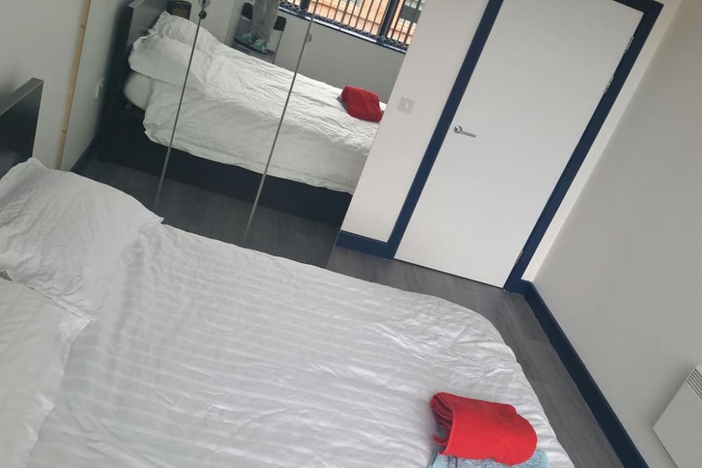 Brand new bed, mirrored wardrobes and new flooring throughout