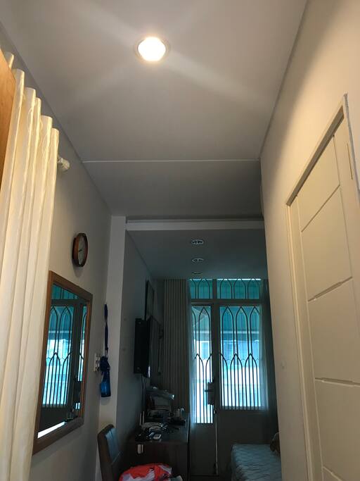 Room entrance :) You can also see your private bathroom door on the right ;)
