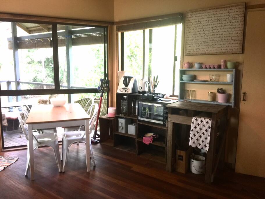 Private room includes kitchenette and dining table.