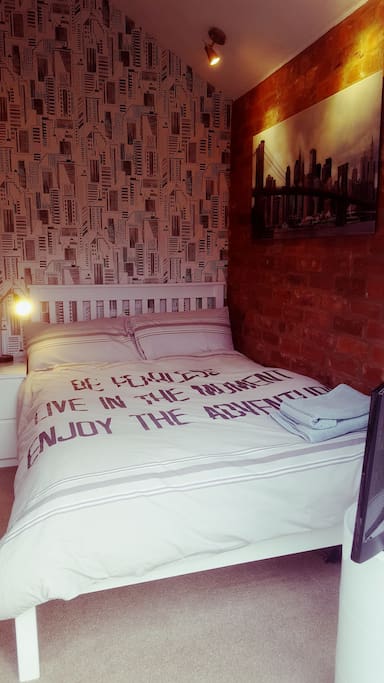 The bedroom has a QUEEN SIZE/SMALL DOUBLE bed