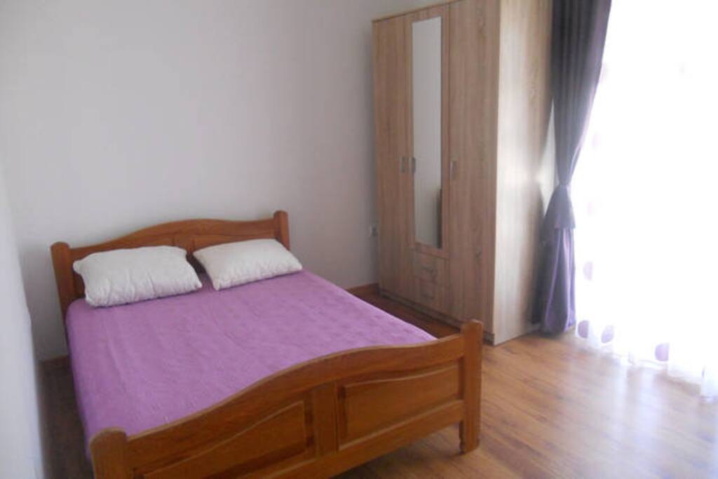 apartment bedroom, there are 3 beds, nice view from balcony