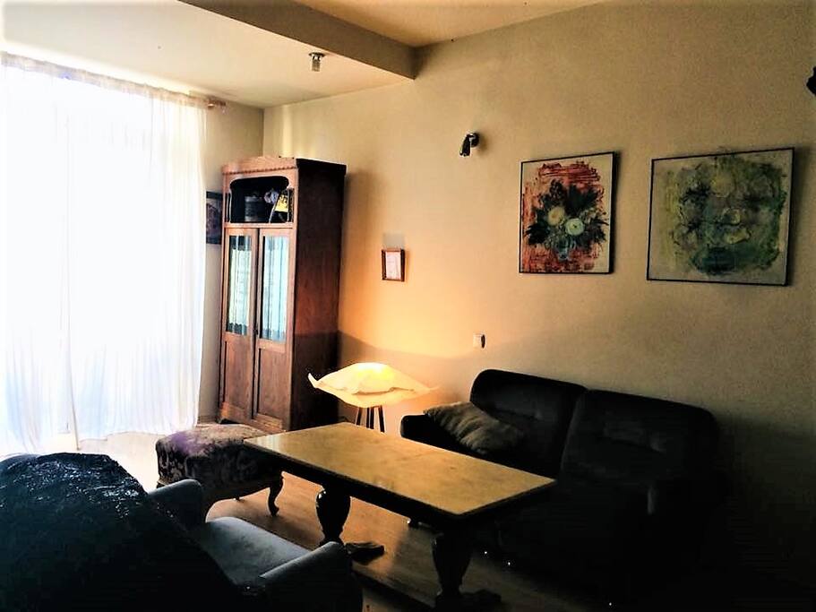 Living room with a queen bed