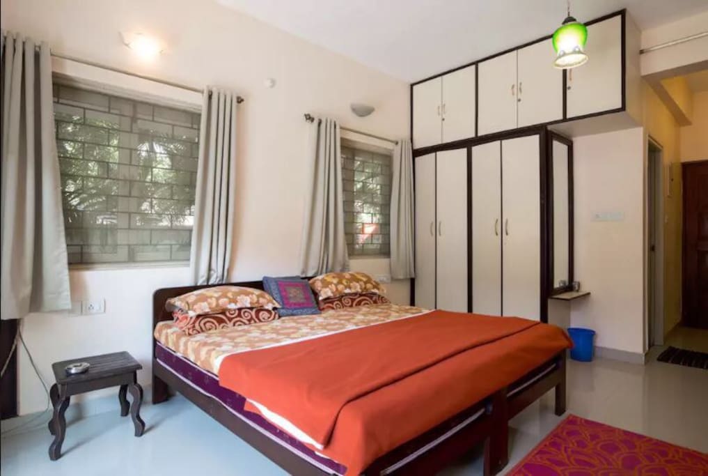 Another view of the bedroom with queen bed