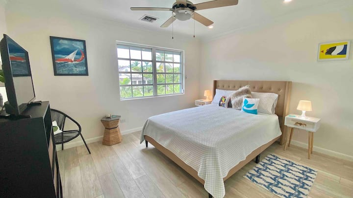 Bedroom 2 - very bright. Electric roll-down shutter provides light control. Smart TV.