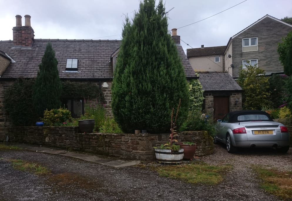 Cruck Cottage showing parking area
