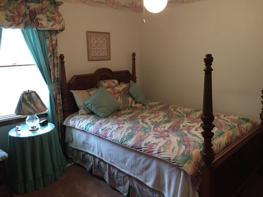 This is the Antique Room, it features a Queen size bed, its own cable TV with Netflix.