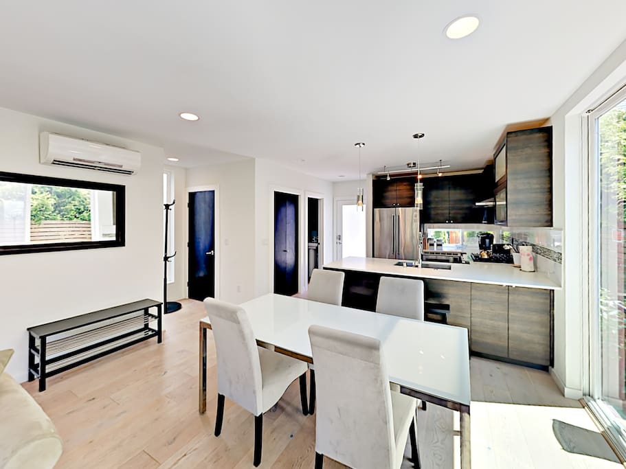 Gather for vacation treats at the dining table with seating for 4.