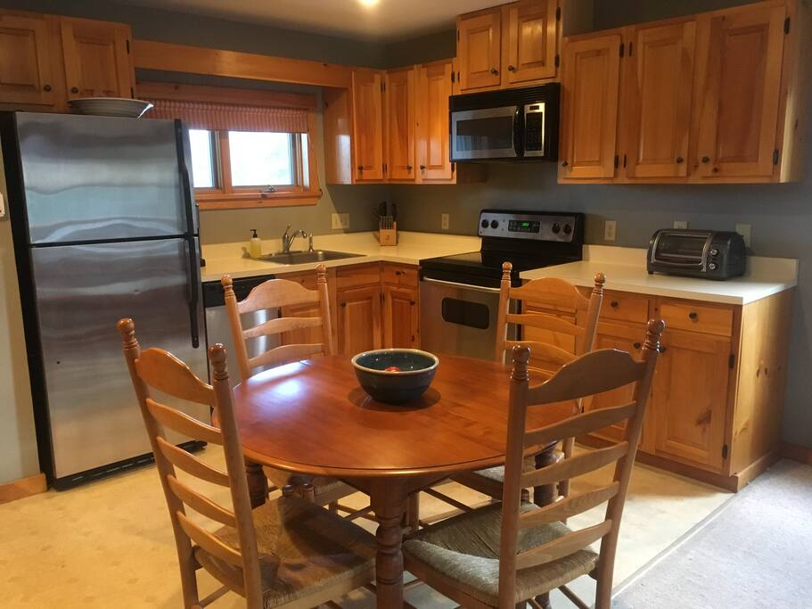 Table has leaf and 2 more chairs