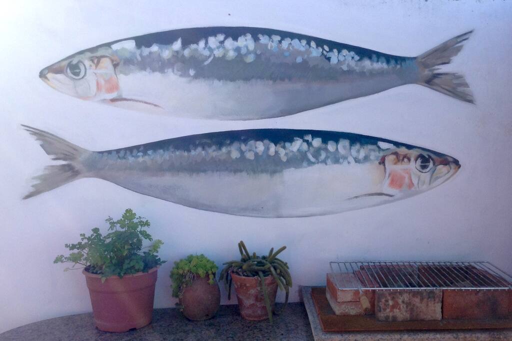 Sardine mural in garden
