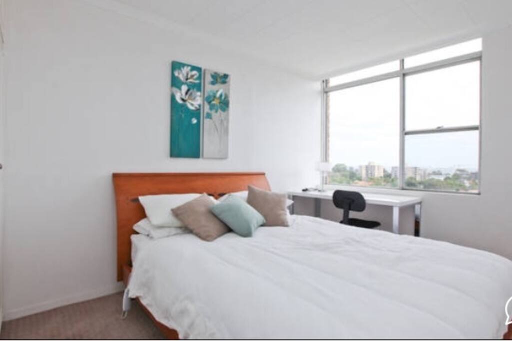 Queen size bed and small desk