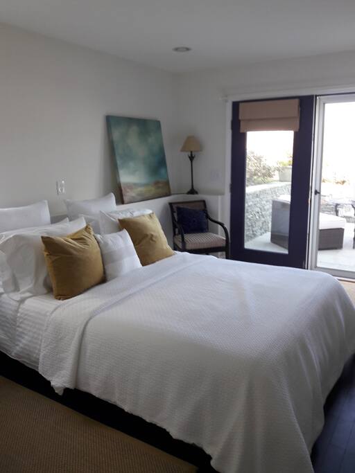 Your bedroom leads to your terrace, garden, and waterviews