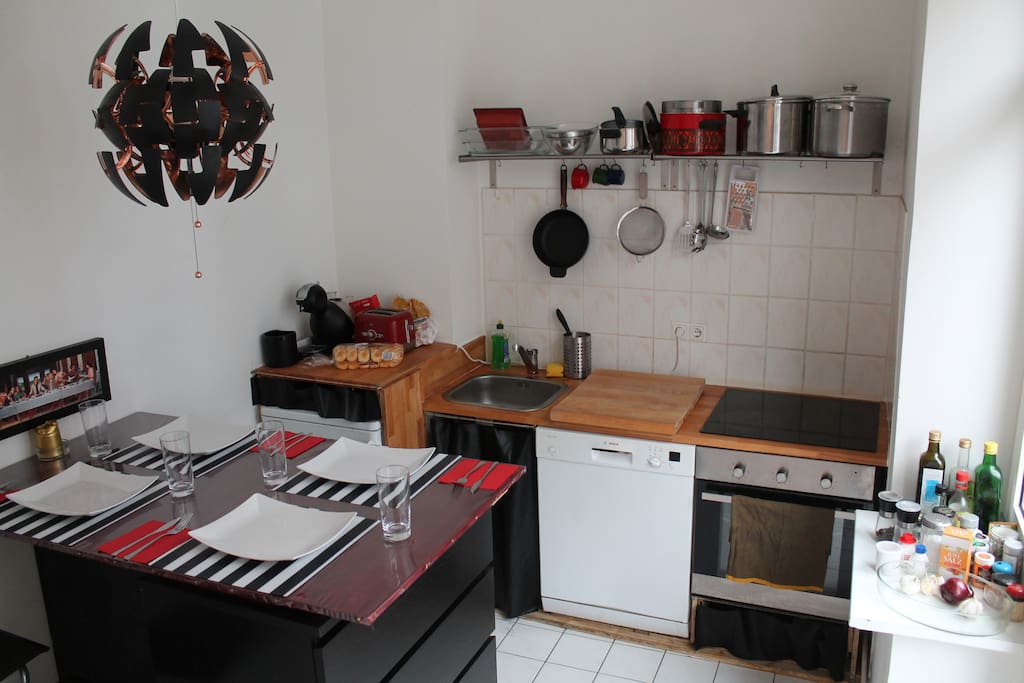 The fully equipped kitchen, including a dishwasher