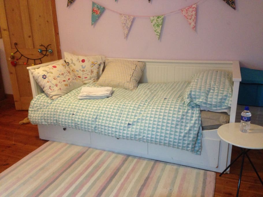 In addition to the double bed there is a very comfortable day bed in the room. This be used as a single bed or it can be opened out to a double.
