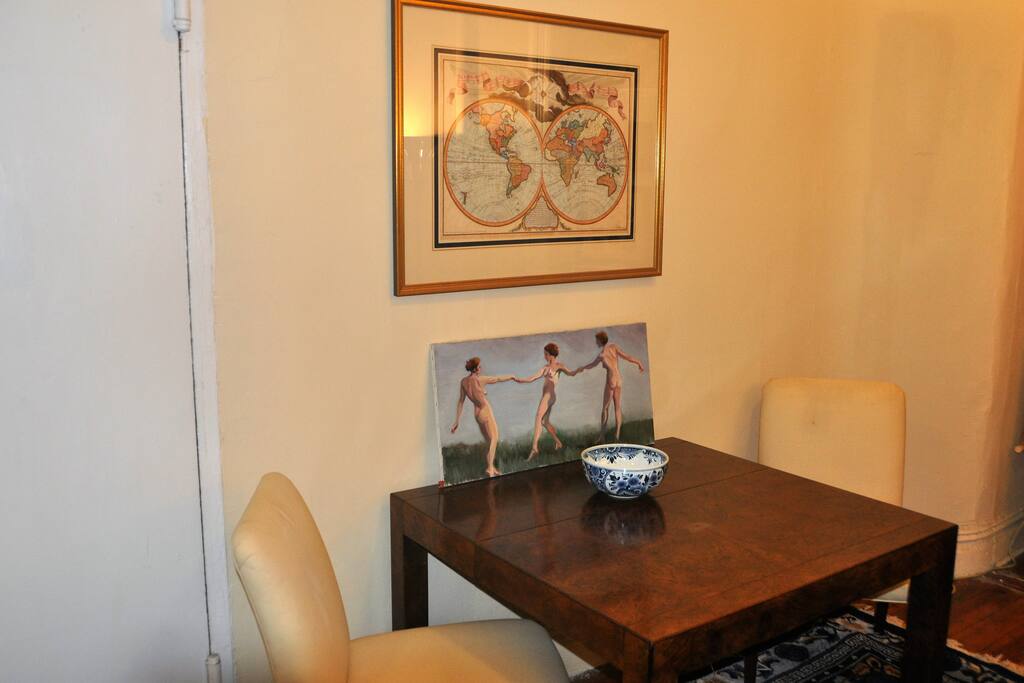 Dining table with antique map.