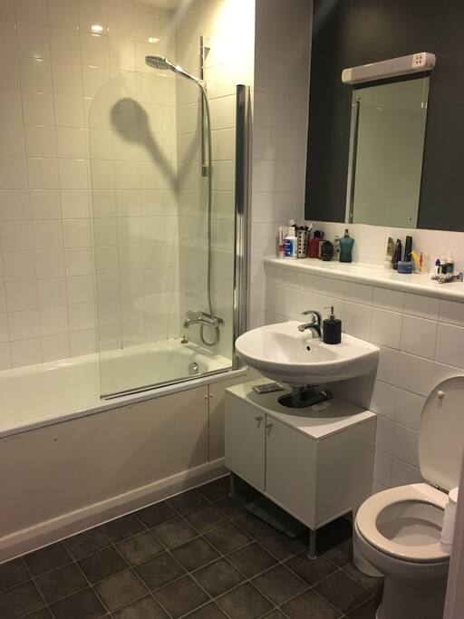 Main Bathroom with shower and bath also heated towel rails.