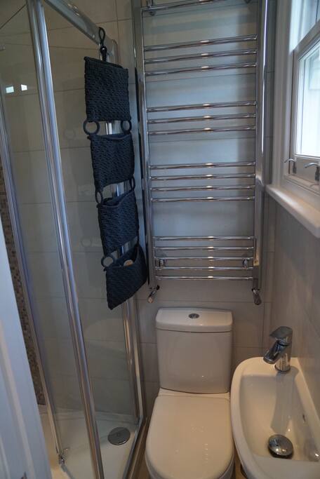 Brand new shower room with designer tiles