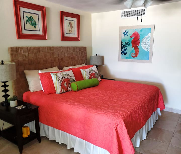 Newly renovated condo with a gorgeous coral decor.