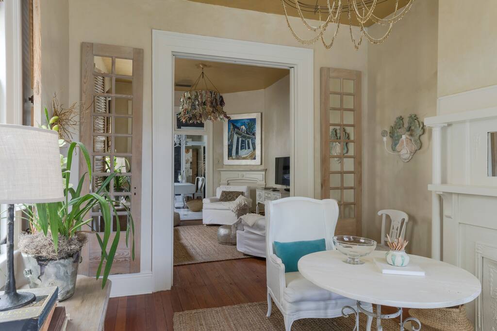 Front rooms upon entering. Game table with two wing chairs and two side chairs. Visitors are encouraged to sign and better yet draw in the guest book.