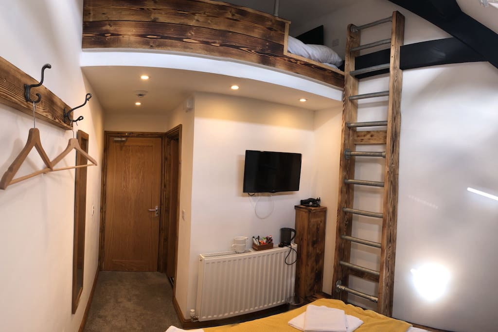 Up the ladder to the hideaway bed.