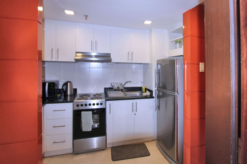 A fully equipped kitchen with all necessary appliances, cookware and utensils, .....