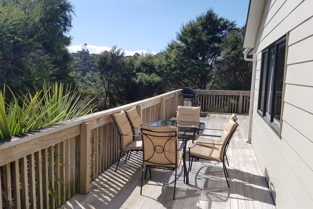 Sun-drenched deck nestled in the tree-tops