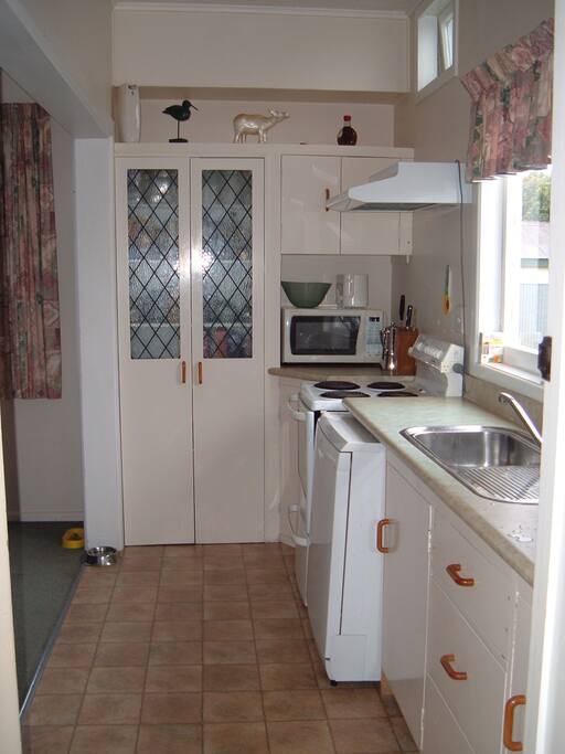 Small kitchen, but has all the things we need like a dishwasher, microwave and oven!