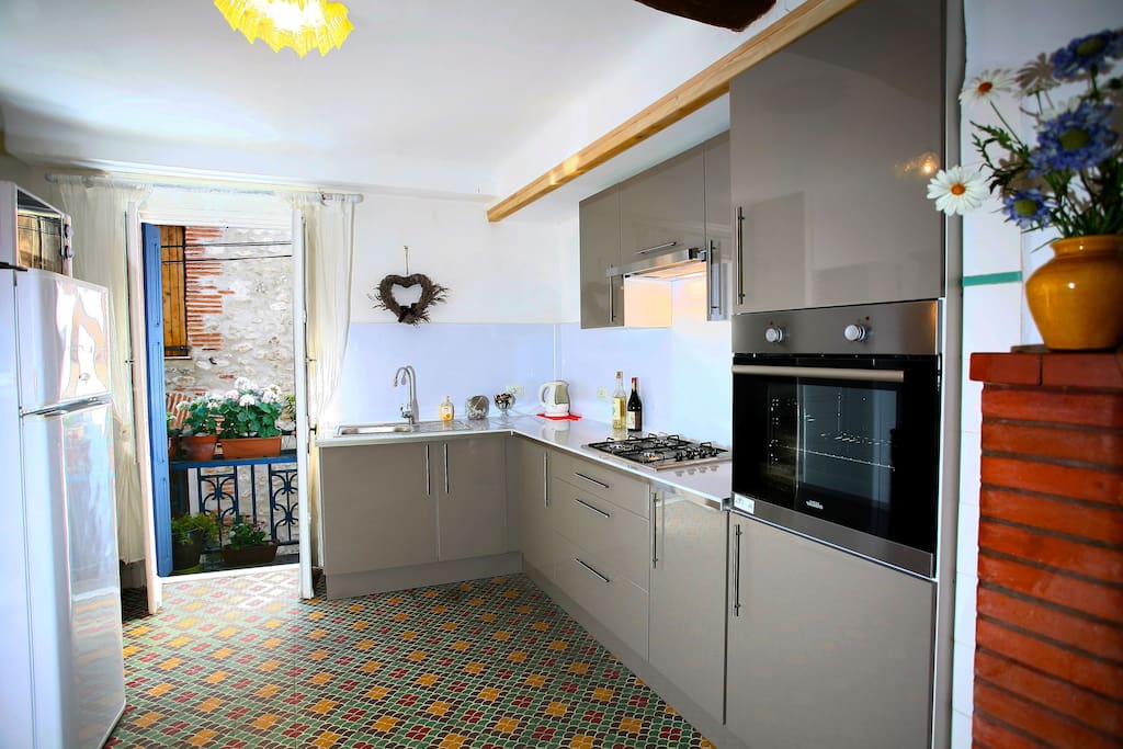 A new modern kitchen, and lovely balcony