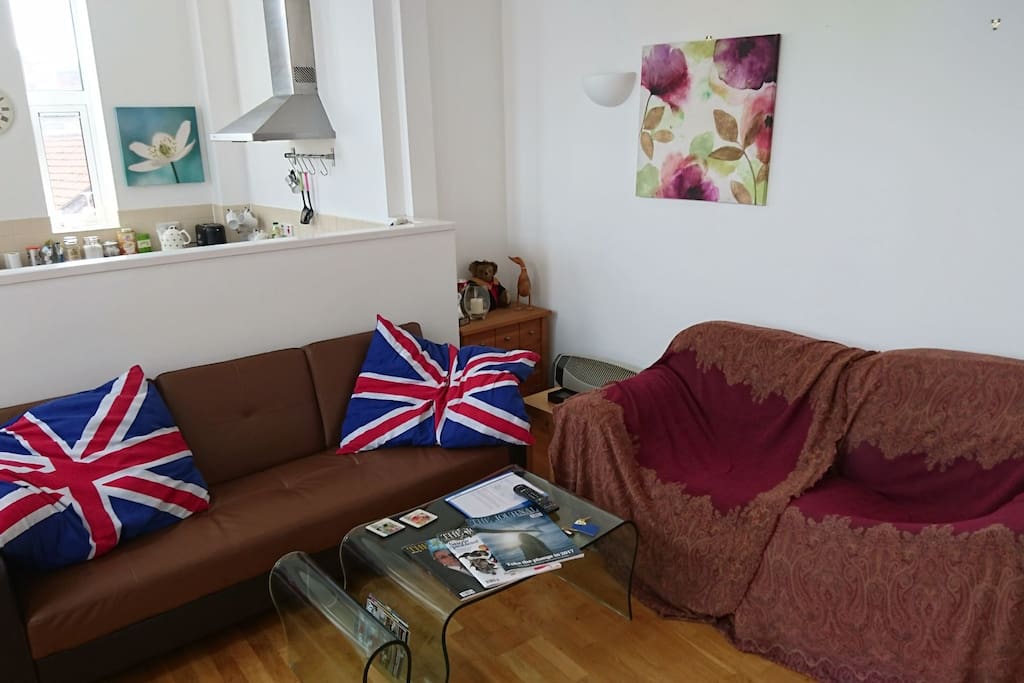 Here is the sofa bed, and two armchairs, (underneath the throw).