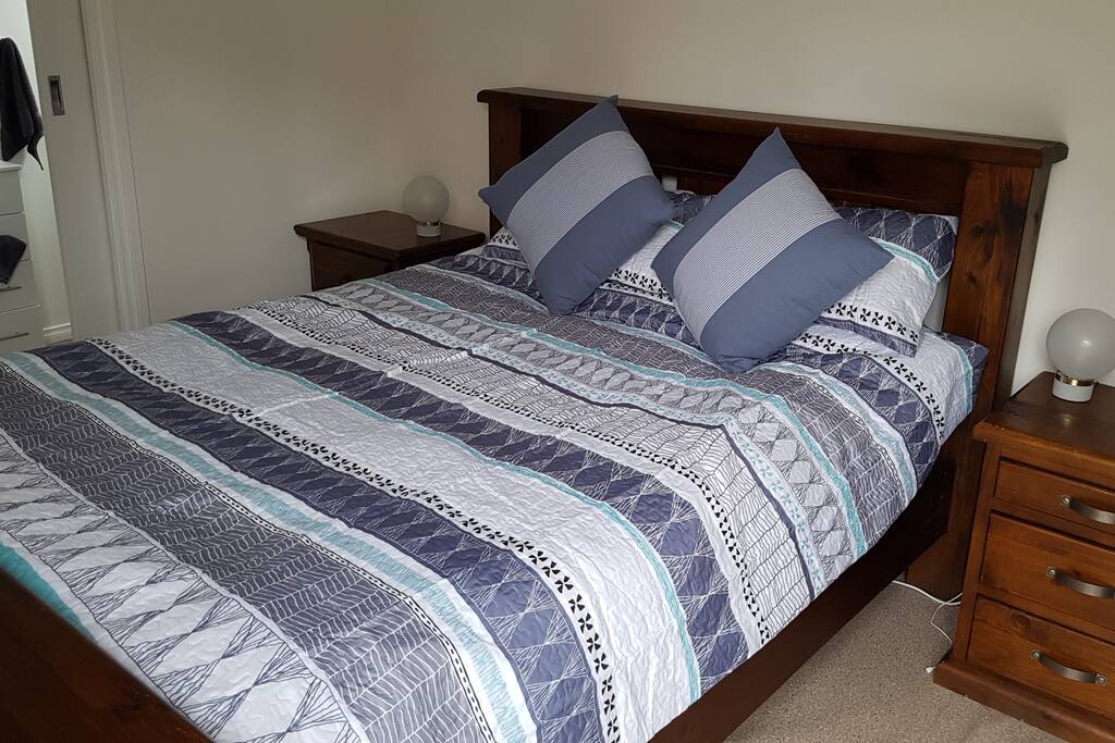Queen size pillow top bed, electric blanket for the winter, split system aorcon for the summer.