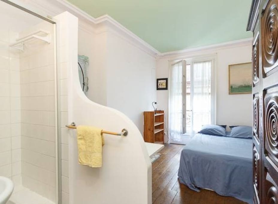 Bedroom with individual shower