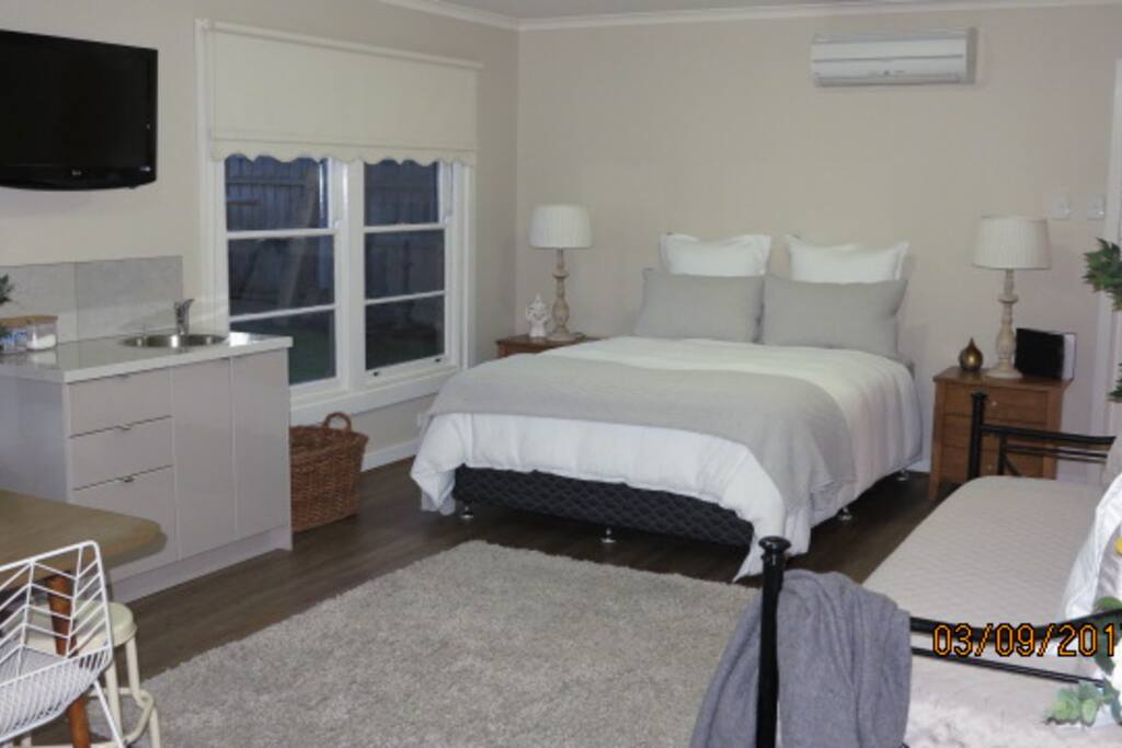 Plenty of natural light with 2 large sash windows overlooking private established garden.