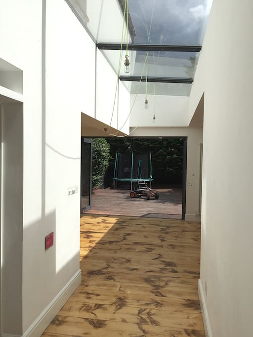 Hallway into the Open plan Kitchen and Skylights